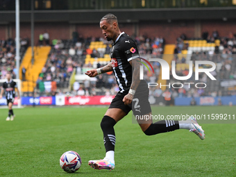 Kellan Gordon of Notts County lines up a cross during the Sky Bet League 2 match between Notts County and Gillingham at Meadow Lane in Notti...