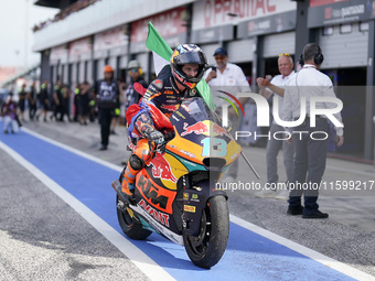 Celestino Vietti of Italy and Red Bull KTM Ajo celebrates the victory of the Moto2 race of the MotoGP of Emilia Romagna at Misano World Circ...