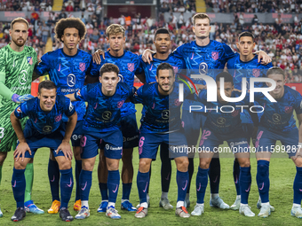 Players of Atletico de Madrid pose for the official photo during the La Liga EA Sports 2024/25 football match between Rayo Vallecano and Atl...