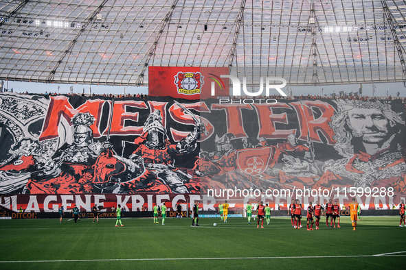 A general view inside the stadium as the fans display a tifo in the stand prior to the Bundesliga match between Bayer 04 Leverkusen and VfL...