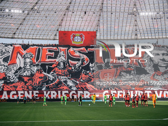 A general view inside the stadium as the fans display a tifo in the stand prior to the Bundesliga match between Bayer 04 Leverkusen and VfL...