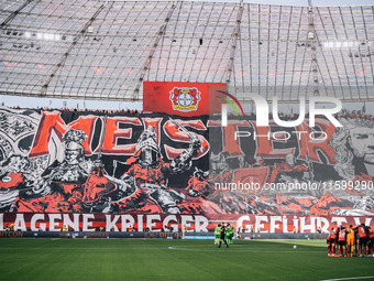 A general view inside the stadium as the fans display a tifo in the stand prior to the Bundesliga match between Bayer 04 Leverkusen and VfL...