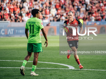 Florian Wirtz of Bayer 04 Leverkusen celebrates his goal during the Bundesliga match between Bayer 04 Leverkusen and VfL Wolfsburg at Bay Ar...