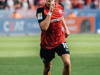 Florian Wirtz of Bayer 04 Leverkusen celebrates his goal during the Bundesliga match between Bayer 04 Leverkusen and VfL Wolfsburg at Bay Ar...