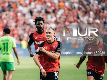 Florian Wirtz of Bayer 04 Leverkusen celebrates his goal during the Bundesliga match between Bayer 04 Leverkusen and VfL Wolfsburg at Bay Ar...