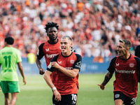 Florian Wirtz of Bayer 04 Leverkusen celebrates his goal during the Bundesliga match between Bayer 04 Leverkusen and VfL Wolfsburg at Bay Ar...