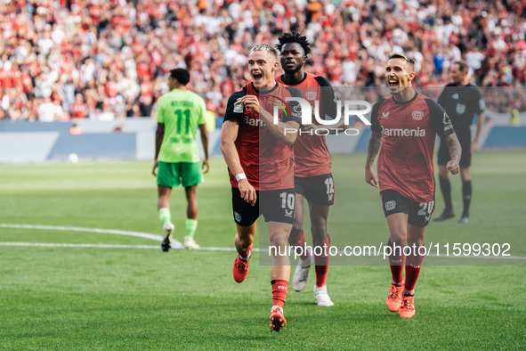 Florian Wirtz of Bayer 04 Leverkusen celebrates his goal during the Bundesliga match between Bayer 04 Leverkusen and VfL Wolfsburg at Bay Ar...