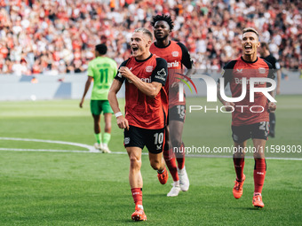 Florian Wirtz of Bayer 04 Leverkusen celebrates his goal during the Bundesliga match between Bayer 04 Leverkusen and VfL Wolfsburg at Bay Ar...