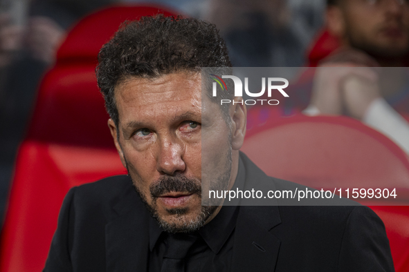 Diego Pablo Simeone, head coach of Atletico de Madrid, sits on the bench during the La Liga EA Sports 2024/25 football match between Rayo Va...