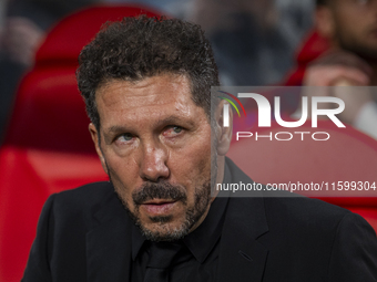 Diego Pablo Simeone, head coach of Atletico de Madrid, sits on the bench during the La Liga EA Sports 2024/25 football match between Rayo Va...