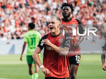 Florian Wirtz of Bayer 04 Leverkusen celebrates his goal during the Bundesliga match between Bayer 04 Leverkusen and VfL Wolfsburg at Bay Ar...