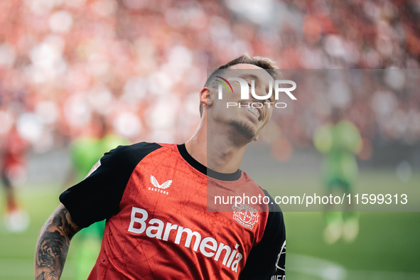 Alejandro Grimaldo of Bayer 04 Leverkusen is in action during the Bundesliga match between Bayer 04 Leverkusen and VfL Wolfsburg at Bay Aren...