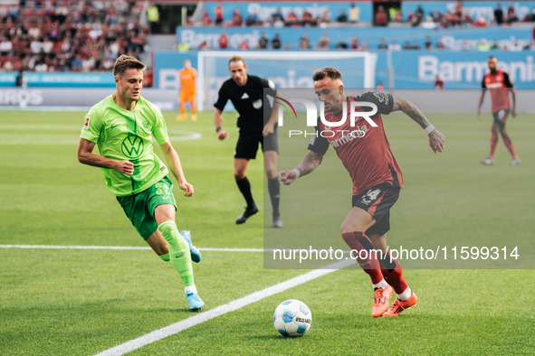 Aleix Garcia of Bayer 04 Leverkusen is in action during the Bundesliga match between Bayer 04 Leverkusen and VfL Wolfsburg at Bay Arena in L...