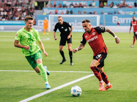 Aleix Garcia of Bayer 04 Leverkusen is in action during the Bundesliga match between Bayer 04 Leverkusen and VfL Wolfsburg at Bay Arena in L...