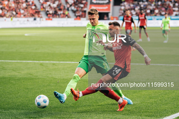 Aleix Garcia of Bayer 04 Leverkusen is in action during the Bundesliga match between Bayer 04 Leverkusen and VfL Wolfsburg at Bay Arena in L...