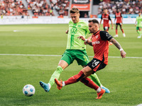 Aleix Garcia of Bayer 04 Leverkusen is in action during the Bundesliga match between Bayer 04 Leverkusen and VfL Wolfsburg at Bay Arena in L...