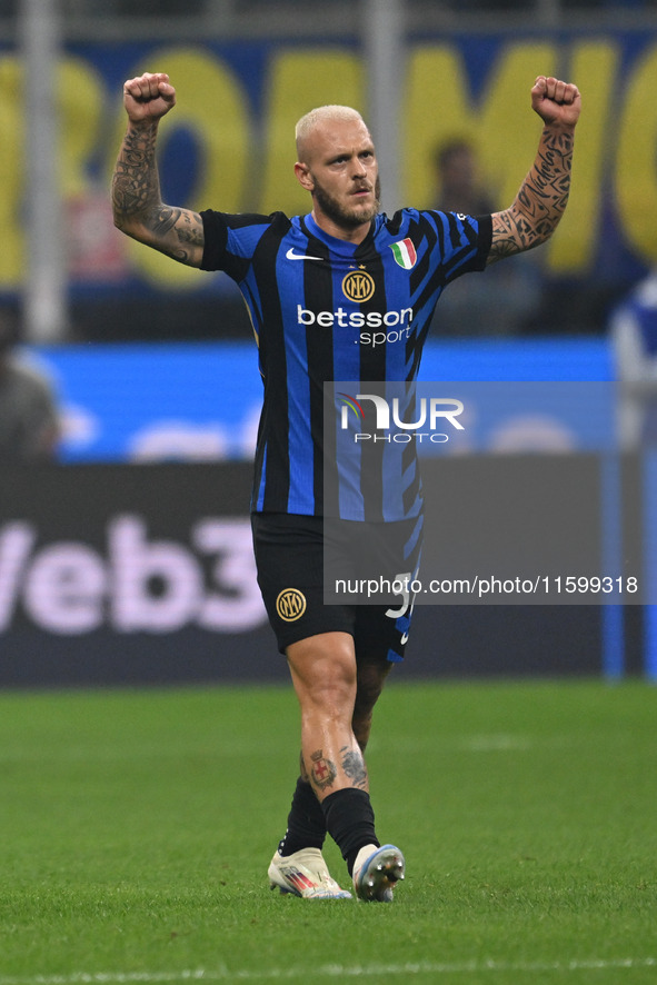 Federico Dimarco of Inter FC celebrates after a goal during the Italian Serie A football match between Inter FC and AC Milan in Milan, Italy...