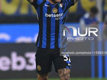 Federico Dimarco of Inter FC celebrates after a goal during the Italian Serie A football match between Inter FC and AC Milan in Milan, Italy...