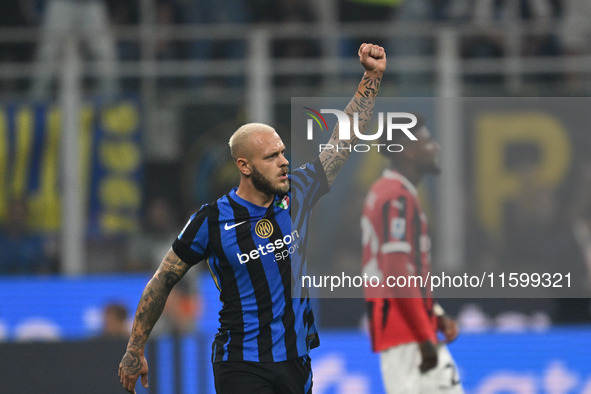 Federico Dimarco of Inter FC celebrates after a goal during the Italian Serie A football match between Inter FC and AC Milan in Milan, Italy...