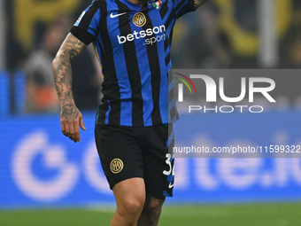 Federico Dimarco of Inter FC celebrates after a goal during the Italian Serie A football match between Inter FC and AC Milan in Milan, Italy...