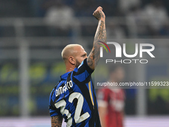 Federico Dimarco of Inter FC celebrates after a goal during the Italian Serie A football match between Inter FC and AC Milan in Milan, Italy...