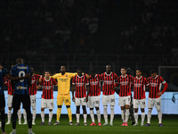 A minute of silence takes place during the Italian Serie A football match between Inter FC and AC Milan in Milan, Italy, on September 22, 20...