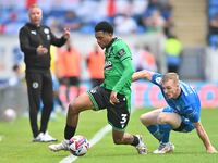 Lino Sousa (3 Bristol Rovers) is challenged by Jack Sparkes (21 Peterborough United) during the Sky Bet League 1 match between Peterborough...