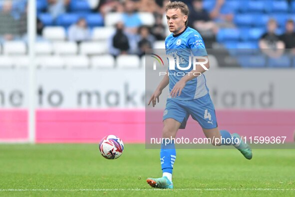 Archie Collins (4 Peterborough United) controls the ball during the Sky Bet League 1 match between Peterborough and Bristol Rovers at London...