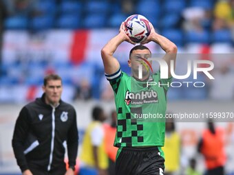 James Wilson (5 Bristol Rovers) takes a throw-in during the Sky Bet League 1 match between Peterborough and Bristol Rovers at London Road in...