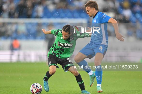 Kor Shaw (37 Bristol Rovers) is challenged by Archie Collins (4 Peterborough United) during the Sky Bet League 1 match between Peterborough...