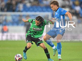 Kor Shaw (37 Bristol Rovers) is challenged by Archie Collins (4 Peterborough United) during the Sky Bet League 1 match between Peterborough...