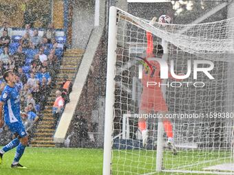 Goalkeeper Jed Steer (31 Peterborough United) tips the ball over during the Sky Bet League 1 match between Peterborough and Bristol Rovers a...