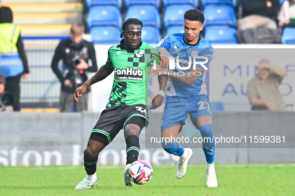 Gatlin O'Donkor (24 Bristol Rovers) and Jadel Katongo (27 Peterborough United) challenge for the ball during the Sky Bet League 1 match betw...