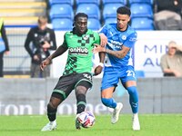 Gatlin O'Donkor (24 Bristol Rovers) and Jadel Katongo (27 Peterborough United) challenge for the ball during the Sky Bet League 1 match betw...