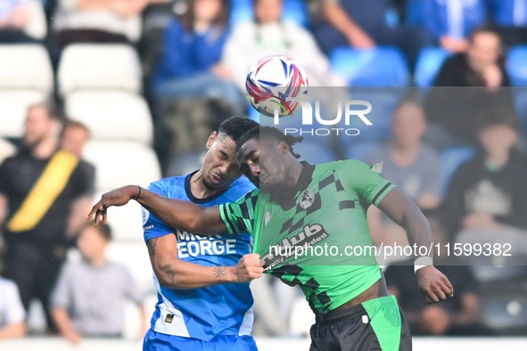 Gatlin O'Donkor (24 Bristol Rovers) and Jadel Katongo (27 Peterborough United) challenge for the ball during the Sky Bet League 1 match betw...