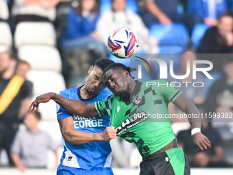 Gatlin O'Donkor (24 Bristol Rovers) and Jadel Katongo (27 Peterborough United) challenge for the ball during the Sky Bet League 1 match betw...