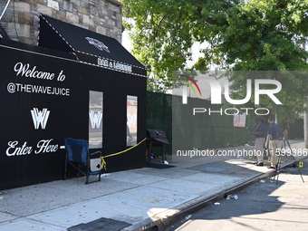 NYPD crime scene investigators search for and collect evidence at the scene outside Wave Juice Bar and Lounge where a 31-year-old man is kil...