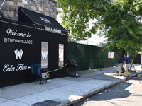 NYPD crime scene investigators search for and collect evidence at the scene outside Wave Juice Bar and Lounge where a 31-year-old man is kil...