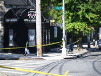 NYPD crime scene investigators search for and collect evidence at the scene outside Wave Juice Bar and Lounge where a 31-year-old man is kil...