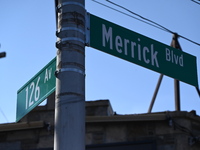 Street signage at the scene. NYPD crime scene investigators search for and collect evidence at the scene outside Wave Juice Bar and Lounge w...