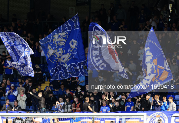 Fans attend the Vanarama National League match between Oldham Athletic and Yeovil Town at Boundary Park in Oldham, England, on September 21,...