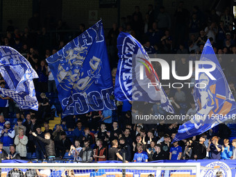 Fans attend the Vanarama National League match between Oldham Athletic and Yeovil Town at Boundary Park in Oldham, England, on September 21,...