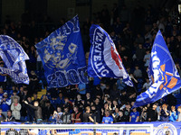 Fans attend the Vanarama National League match between Oldham Athletic and Yeovil Town at Boundary Park in Oldham, England, on September 21,...