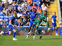 Mike Fondop of Oldham Athletic Association Football Club tussles with Morgan Williams of Yeovil Town Football Club during the Vanarama Natio...