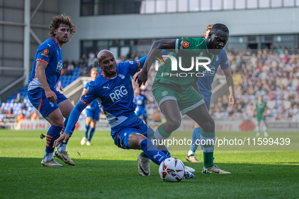 Jake Caprice of Oldham Athletic battles for possession during the Vanarama National League match between Oldham Athletic and Yeovil Town at...