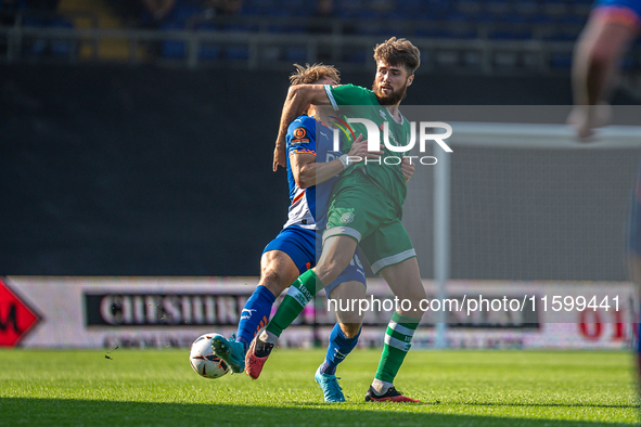 Yeovil Town's Aaron Jarvis battles for possession during the Vanarama National League match between Oldham Athletic and Yeovil Town at Bound...