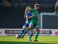 Yeovil Town's Aaron Jarvis battles for possession during the Vanarama National League match between Oldham Athletic and Yeovil Town at Bound...