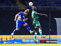 Reagan Ogle of Oldham Athletic Association Football Club tussles with Frank Nouble of Yeovil Town Football Club during the Vanarama National...