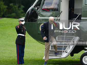 U.S. President Joe Biden speaks to reporters after returning to the White House on September 22, 2024 in Washington, DC. Biden hosted a 'Qua...