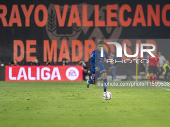 Samuel Lino of Atletico de Madrid is in action with the ball during the La Liga EA Sports 2024/25 football match between Rayo Vallecano and...